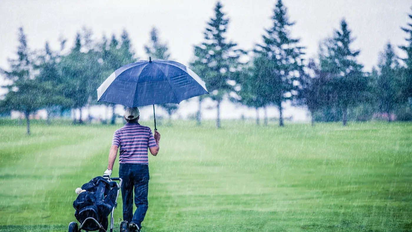 Golfare i regn